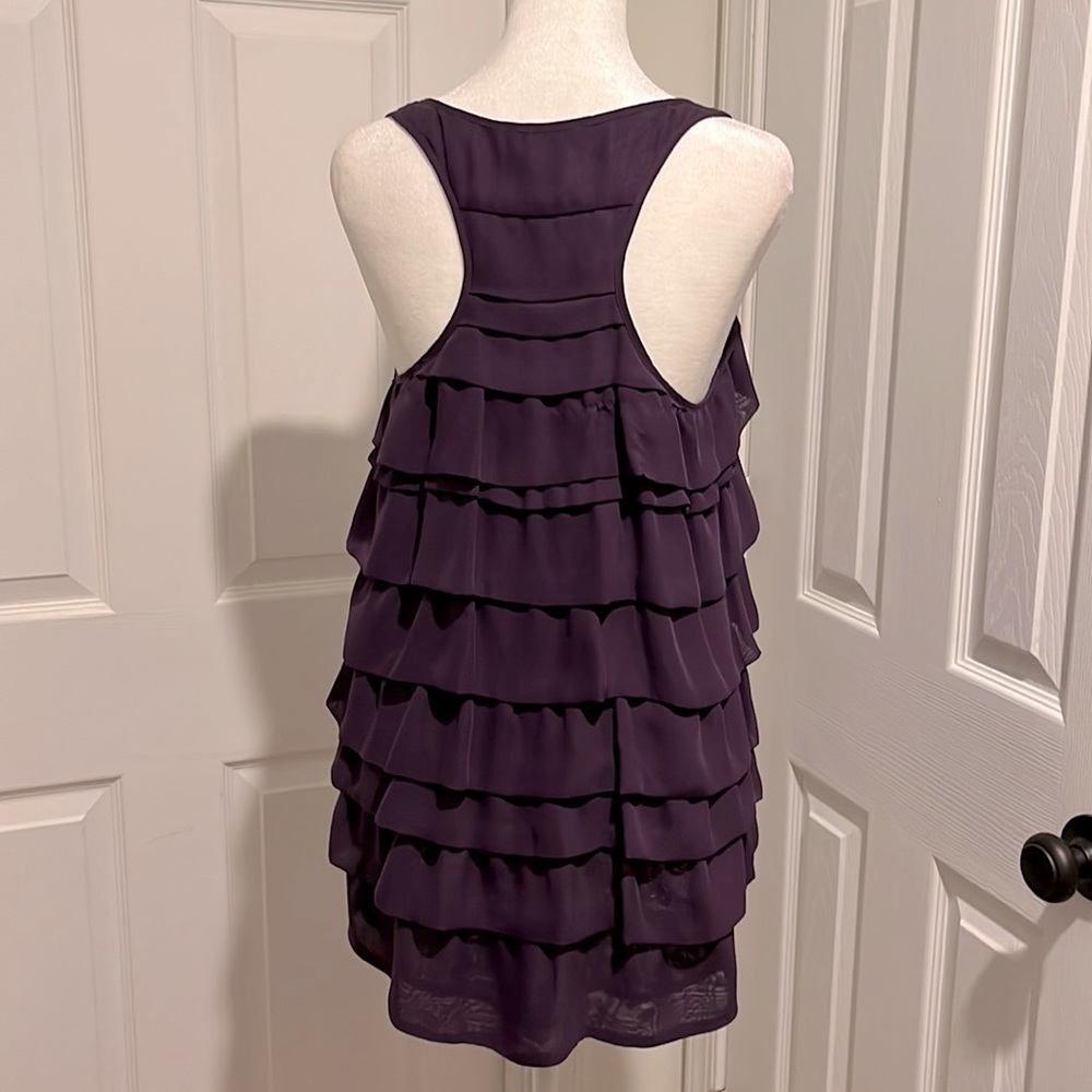 Hannah G. Razor back tank top. Beautiful shade of purple. Side zipper. Size M.